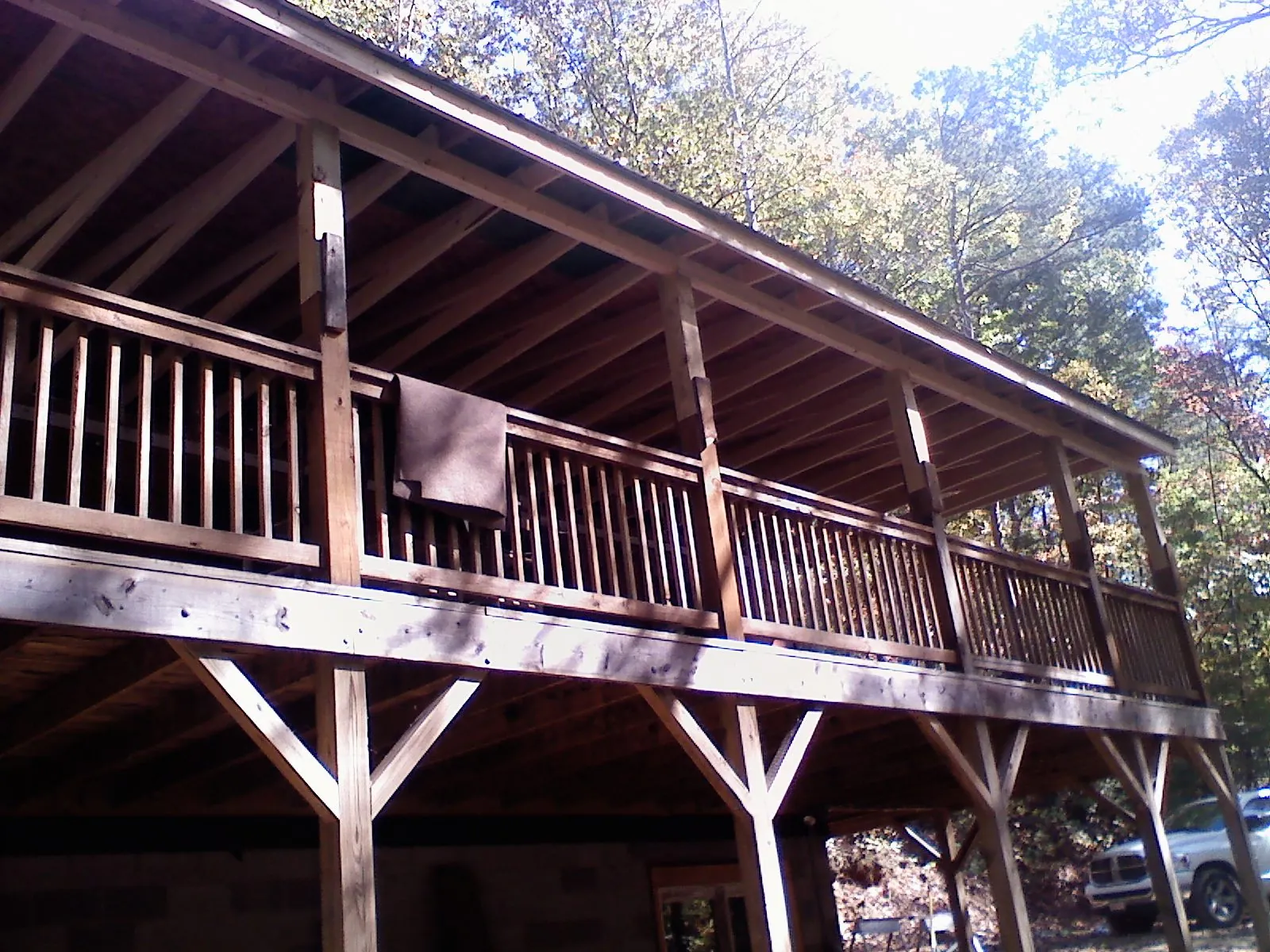 Timber framing under a new elevated porch and deck — Roof Leak Repair in Postville by Roofing Brothers